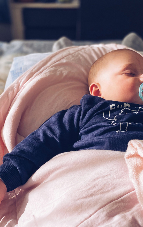 baby sleeping with pacifier