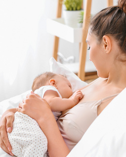 Mother breastfeeding baby 