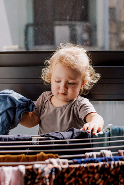 toddler drying clothes